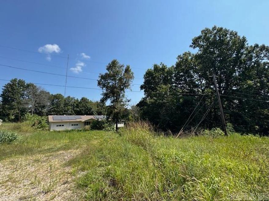 HURRY! This home is sitting on its own corner lot and is minutes from Norfork Lake Access. Attached garage, basement, large yard, sunroom and a covered front porch. You won't want to miss out on this deal! Buyer to verify all information about property.