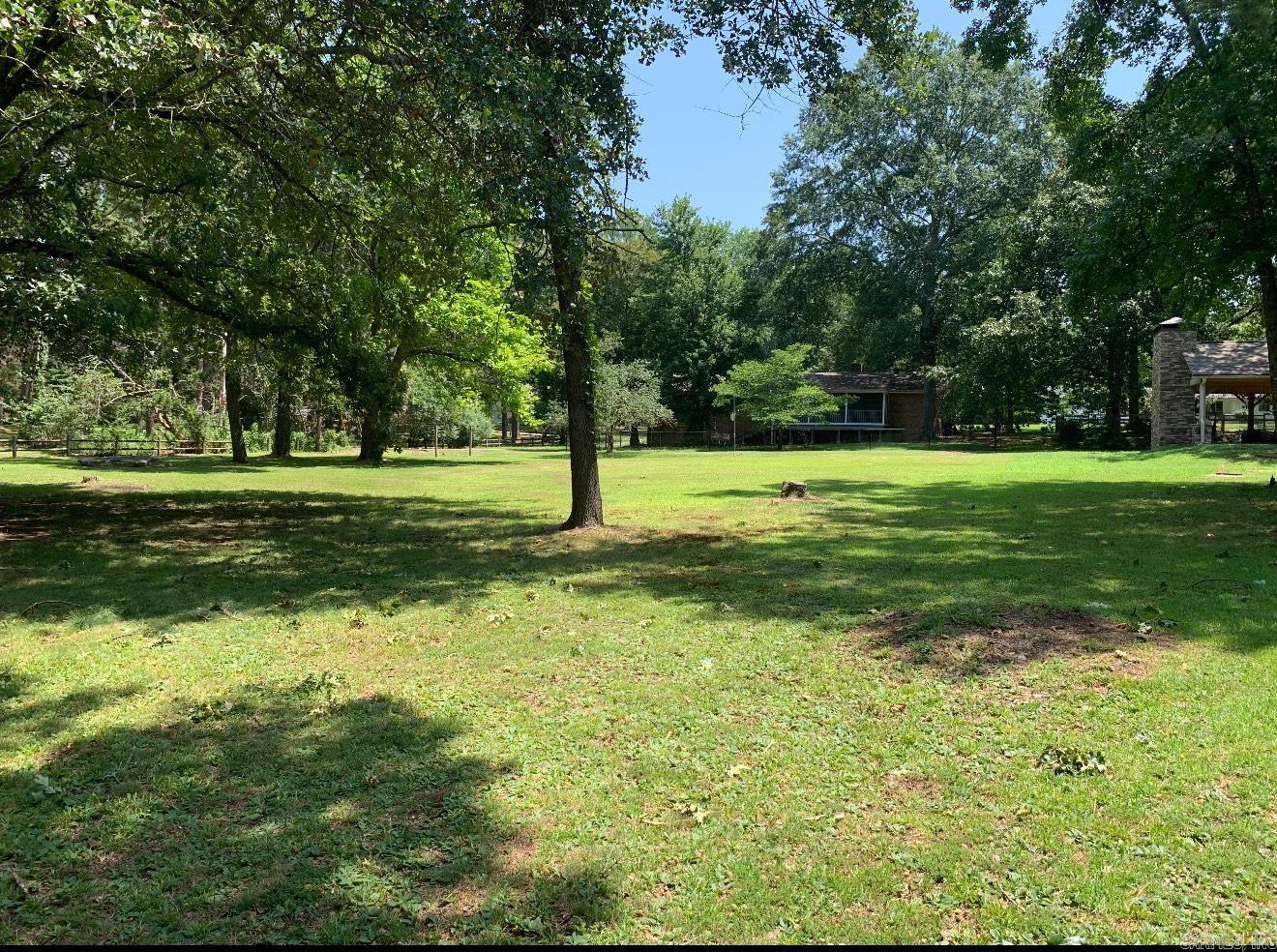Build your dream getaway near Greers Ferry Lake! This beautiful, level lot in Heber Springs sits across from the lake in a desirable and well-kept subdivision. Surrounded by mature shade trees, the property offers a peaceful yard with easy access to outdoor recreation. Enjoy the charm of the neighborhood and the convenience of being just minutes from town, the marina, and local attractions.