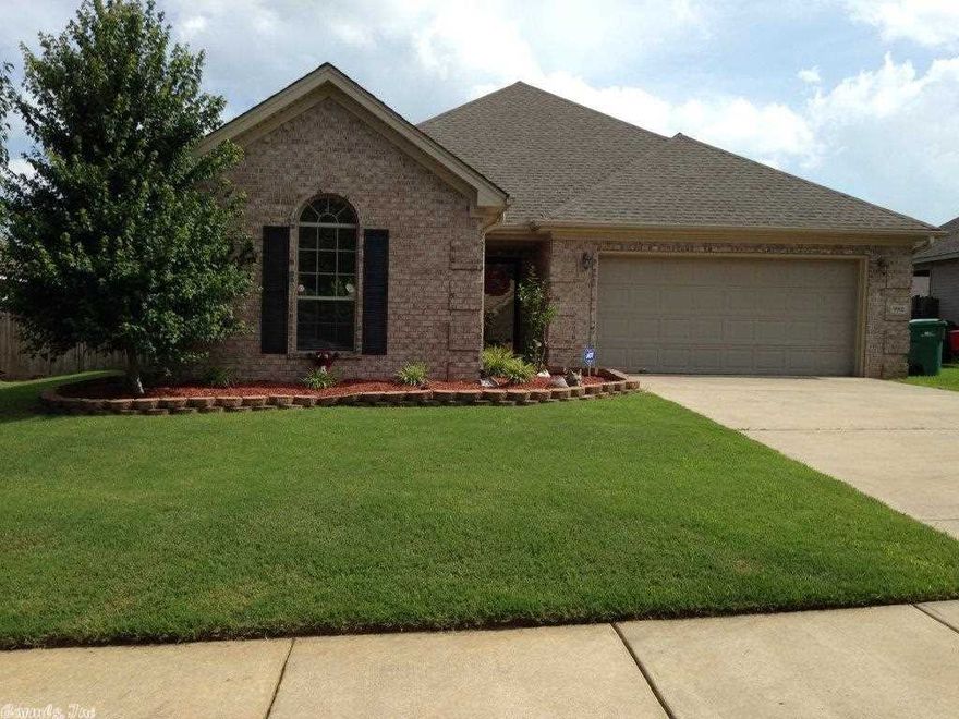 Wonderful 3 bedroom, 2 bath home! Very  nicely decorated with modern feel. Hardwoods in foyer and living room. Eat-in kitchen with breakfast bar, granite tile countertops, and stainless appliances, open to living room. Master has his & hers closets, jetted tub, and double vanity. Huge backyard with deck. This one is a definite must-see!