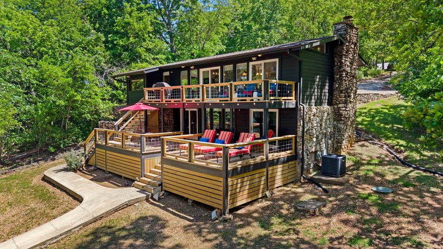 LOWECATION, LOWECATION, LOWECATION!  Welcome to the market, 53 Wyandotte on gorgeous Lake Thunderbird In Cherokee Village!  This home represents what happens when "Lake Life" and sophistication meet!  MOVE-IN ready and waiting for it's new owners.  Affectionately named "Trillium", this stylish home has been completely remodeled and used as a very successful short term rental for 2.5 years.  New roof and septic within last 2 years.  New exterior paint and decks within last year.  Covered boat dock with boat lift, and gentle sloping lot to the lake!  Inside an oasis awaits!  Flooring, paint, fixtures, appliances, windows are all updated!  Home can remain furnished with acceptable offer. Decor, decor elements, cabinet contents ,and boat are also negotiable, making this truly an exceptional deal!  Write an offer today and enjoy this home just in time for summer at the lake!  Whether you are making this your permanent home, weekend retreat, or short term rental, this home can check all the boxes.  Call your favorite Realtor for a showing ASAP!