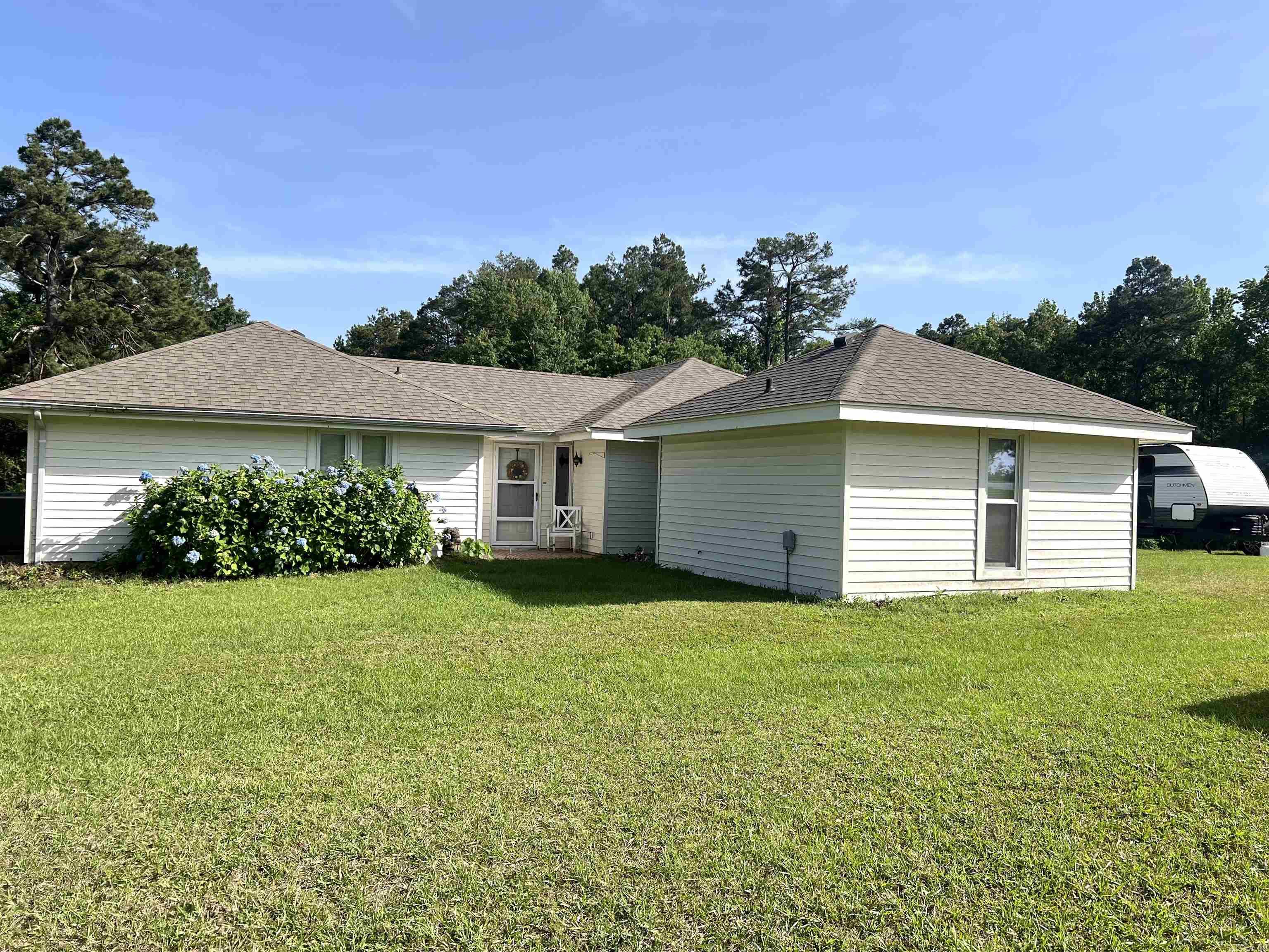 Don’t miss out on this opportunity. This house sits in a spacious, well established neighborhood approximately 4 miles from the commercial center of Monticello. With 5.75 acres of land, this property contains both a secluded swimming pool for those hot summer days, and a good sized pond which was recently stocked. The 1800 square foot house is 3 bedroom and 2 bath with vaulted ceilings and finished flooring. There is a wood deck overlooking the pool and back yard for entertainment and leisure.