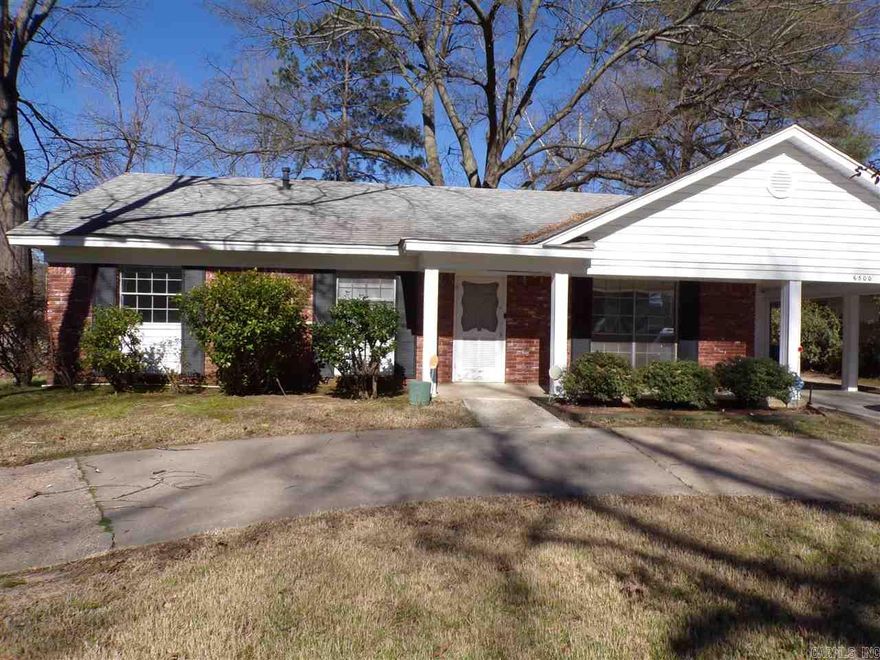 Outgrown your living rm? This one has room for you to spread out - it features a living room, small breakfast area, den/kitchen combo or kitchen/dining combo plus a sunroom across the back that is heated/cooled, and floored attic space for stg. It has a carport plus a circle drive, brick/siding ext, a fenced yard, an outside stg rm plus a 14x20 site built stg bldg.  It has a newer roof and a security system.  This is an estate, to be sold "As Is" & limited disclosure info.