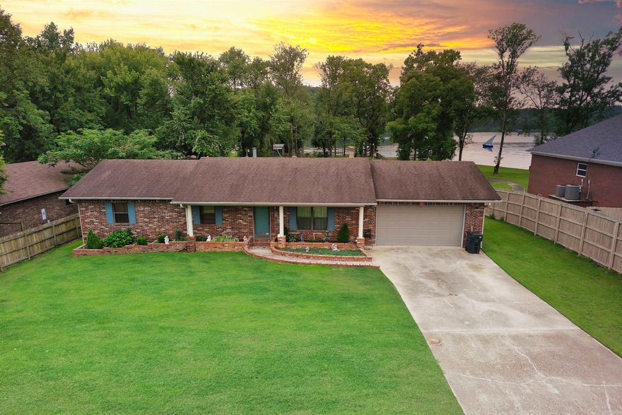 Are you ready to enjoy lake life and convenience? This could be the perfect property for you! The setting is amazing. Need a workshop? You will love the 20x40 shop that is perfect for your hobbies and special projects. You will love the lake views, the shade from the mature trees and the incredible space to make this special property your dream come true. Seeing the potential of this property is believing.