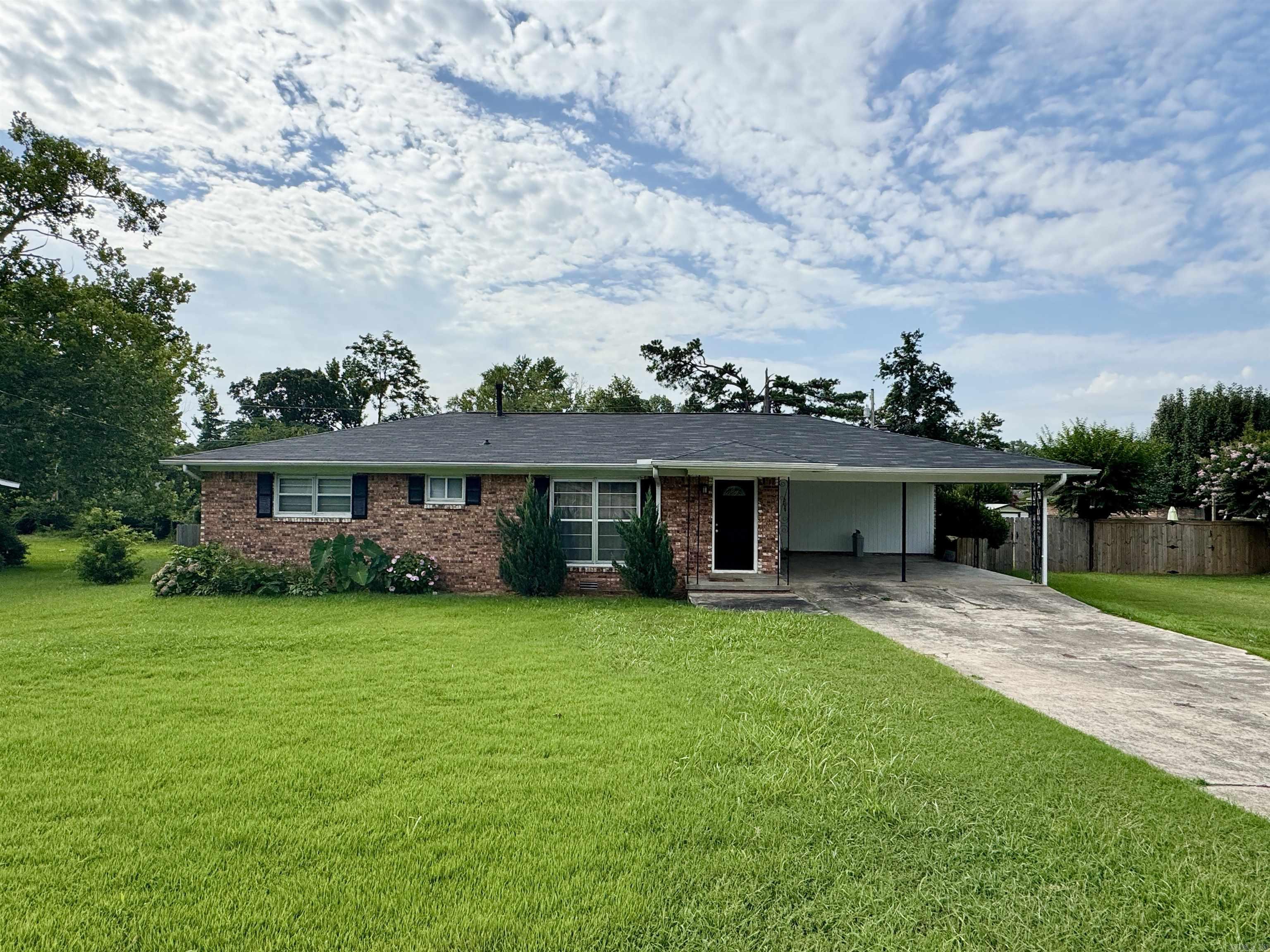 This updated cozy home is searching for its new family! Newer roof, fence, appliances. Did I mention the 70" TV (patio) conveys? Spacious 3 bed, 2 bath, updated kitchen with granite countertops, huge lot, detached garage that could be used as extra parking, storage or work area. This home will also come with a 1 YEAR HOME WARRANTY from the seller! Tons of natural light! Minutes from restaurants, shops, churches, & schools. Welcome home! AGENTS SEE REMARKS*