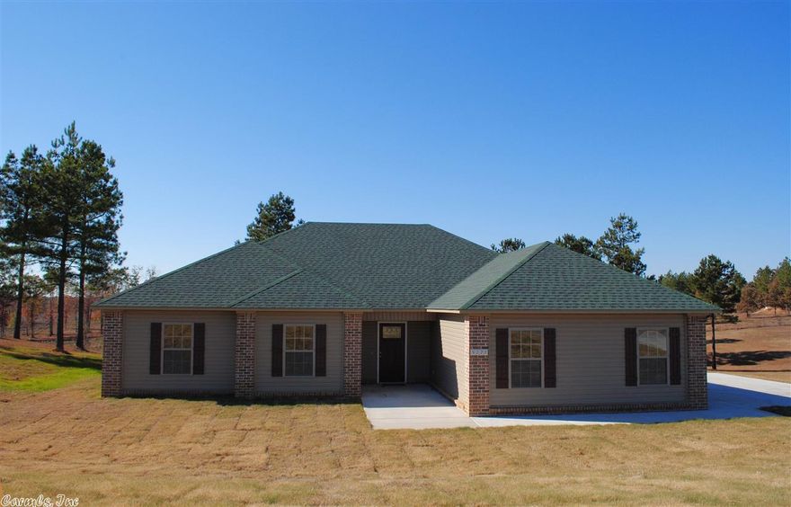 Quality New Construction Home in the Bauxite Area. This 3 BR 2BA home features a very open floor plan, approx 1750 sq ft on approx 1.12 acres. Great Room with Wood Burning Fireplace and ceramic tile flooring, Tray Ceiling,  Kitchen-Dining Combo, Stainless Appliances, Oak Cabinets, Pantry, Granite Counter Tops, Ceramic Tile in all wet areas, Walk-in Closets, 2 car garage w/ keypad, covered back porch, in Bauxite School District, AND qualifies for a No Money Down USDA Rural Development Loan.