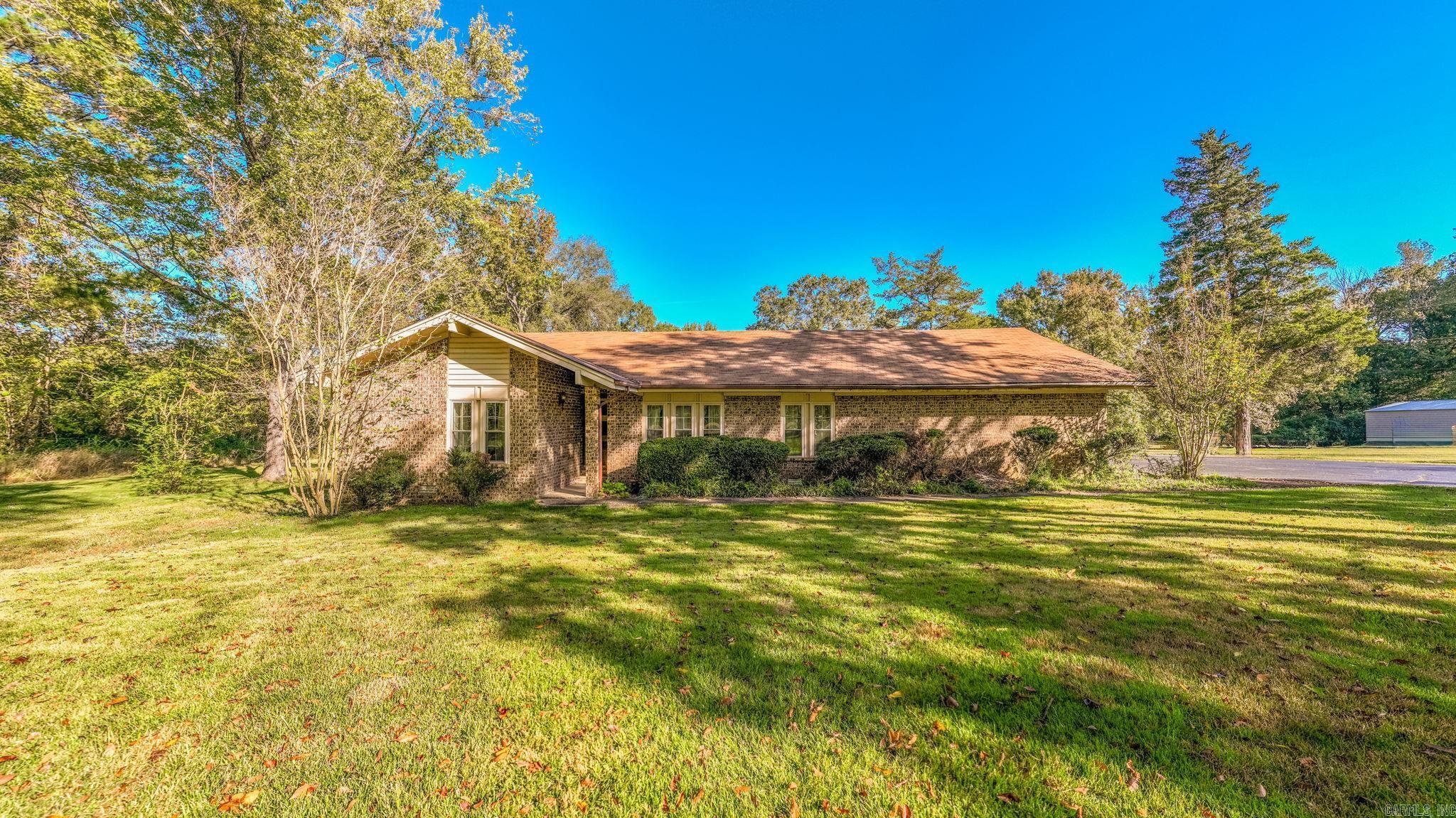 Beautiful Tree Covered lot with a sprawling 4-bedroom home and a shop located just outside of Conway. New HVAC, new Septic System and upgraded to public water. all within the last 2 years.