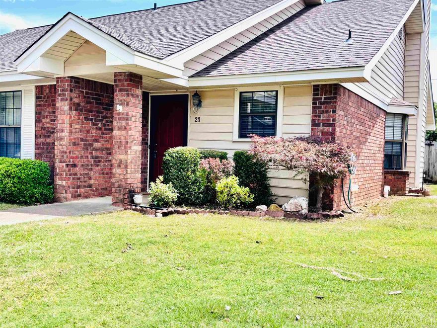 Welcome to this one level condo in the Dark Forest community, offering comfortable living space and easy, low-maintenance living with convenient access to I-30, shopping, dining, and entertainment. The open living/dining combo features a gas fireplace and bay window, plus a breakfast bar, ideal for casual meals and entertaining.  Updated appliances in the kitchen, including the gas stove/oven, vent-a-hood, and dishwasher. This move-in ready condo is perfect for retirees, first-time buyers,, or investors seeking simple living, with a focus on a straightforward, uncluttered way of life. Whether you're relaxing on the covered patio or enjoying community spaces, this home offers comfort and convenience in one package. Nestled in a friendly neighborhood setting and priced competitively—schedule your private showing today and make 23 Dark Forest Place your new home.