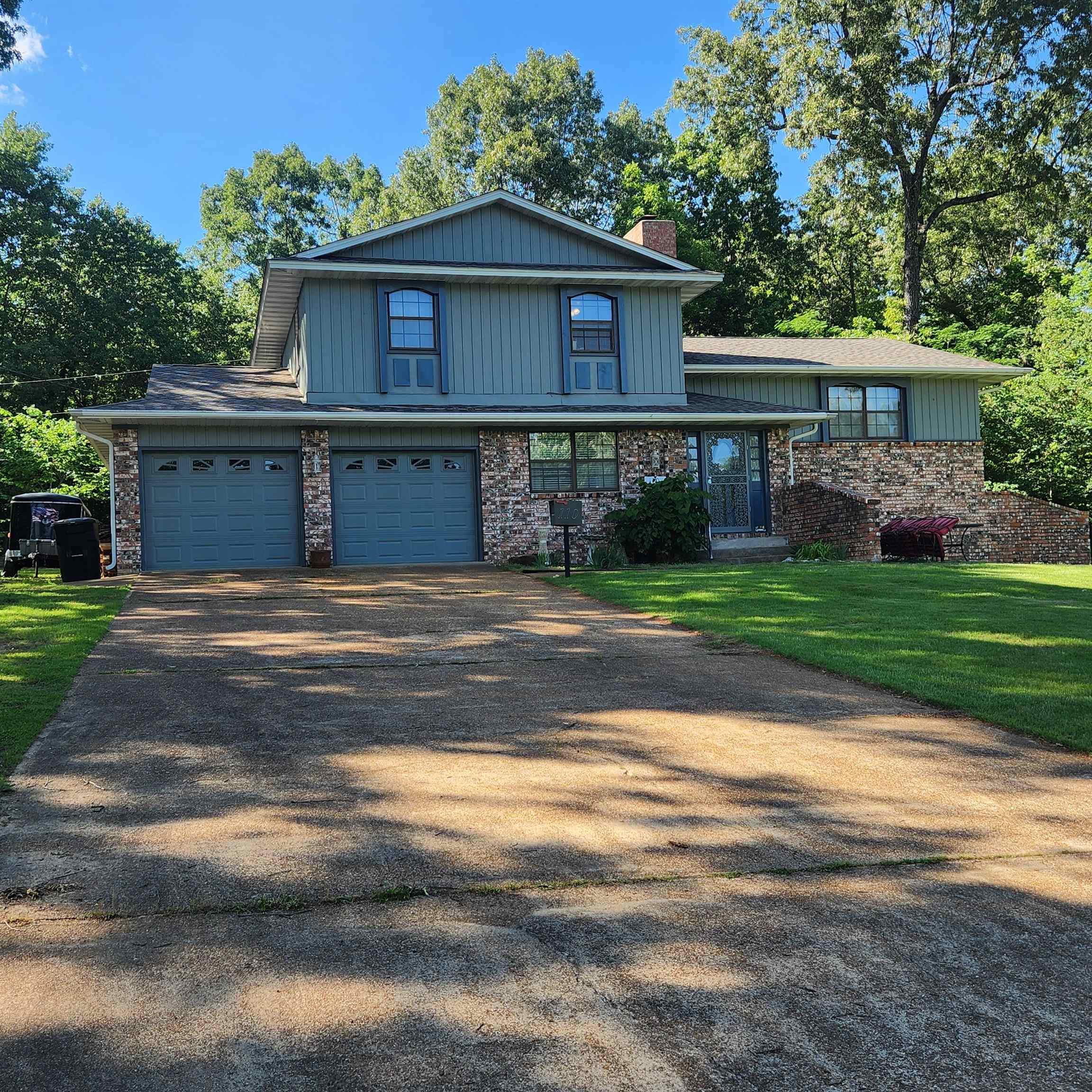 Lake Views of Crown Lake from this awesome 4 Bedroom home with 2 & 1/2 bathrooms. Plenty of Room downstairs in the fully finished basement to easily add 2 bedrooms. Plenty of storage and bonus space in this multi-level home. Family room w/vaulted ceilings and a formal living room with wood burning fireplace. 2 Car garage w/remote door openers, storage and shop area. Detached shop in back with new diamond deck kickplates on the doors. Large level yard. Newly installed electric stair chair. Covered back deck with views of the lake for relaxing, may be a great spot for a hot tub. This home has been fully upgraded, with new paint, inside & out including the workshop. New Roof, New leaf guards on gutters, 2-New HVAC units (1 in 2023 & 1 in 2021), New Carpet, padding, laminate flooring, new receptacles and European rocker style light switches with dimmers. (75 in all.) 8-New Energy Efficient Fans with remote controls, new door hardware throughout, including the hinges and so much more. Read the attached seller docs. This is a smoke-free, pet-free home. "No shoes" have been worn in the house since new flooring installed. Sellers are selling due to Health Issues. Owners #(702)-250-3848