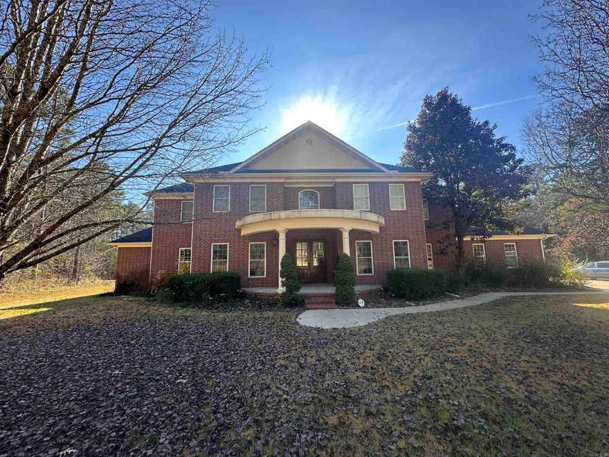 Wonderful home on 3.89 acres, just minutes from town. Featuring six bedrooms and four full baths, including a luxurious master suite with backyard views and a convenient main level guest room/nursery. The kitchen boasts granite countertops and double convection ovens. Enjoy the grand entrance, bonus room and heated/cooled storage upstairs. Outdoor highlights include a gated entrance to the neighborhood, covered porch, three car garage, and large parking area for guests.