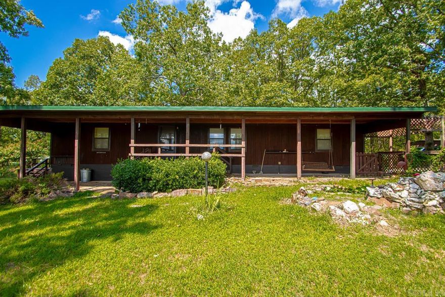 Welcome to your private oasis near Lake Maumelle and the Ouachita National Forest. This charming 3-bedroom, 2-bathroom home offers the perfect blend of comfort and tranquility. Nestled in a secluded setting, the property features a spacious deck that overlooks stunning scenic views, providing the perfect backdrop for relaxation. With close proximity to nature, you’ll have easy access to outdoor adventures while still enjoying the serenity of your own retreat, set on approx. 12.5 wooded acres.