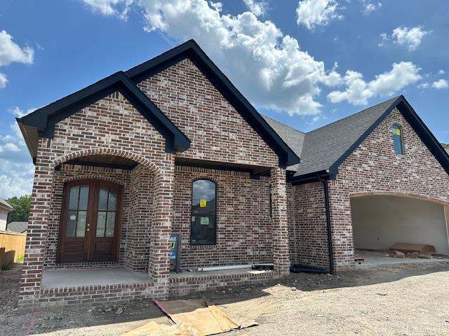 Under construction & nearly complete in the coveted Copper Run community of West Little Rock! Welcome to 66 Copper Circle, an expertly designed Randy James Construction home offering exceptional craftsmanship in a prime location. This stunning home features 3 bedrooms, 2 full bathrooms, a powder bath, and a versatile flex space off the foyer, perfect for a home office, playroom, or yoga retreat. Thoughtfully curated designer finishes and a functional layout make this home a standout. The private owner's suite is a true retreat with dual vanities, a soaking tub, and a luxurious walk-in shower. The ensuite bath connects seamlessly to a custom walk-in closet and laundry room for everyday convenience. Enjoy both a front and back porch, with the rear porch boasting a cozy outdoor fireplace, perfect for Fall evenings. Anticipated completion mid-September. Don’t miss your chance to own this gorgeous new build in one of West Little Rock’s most sought-after neighborhoods. This is the one!