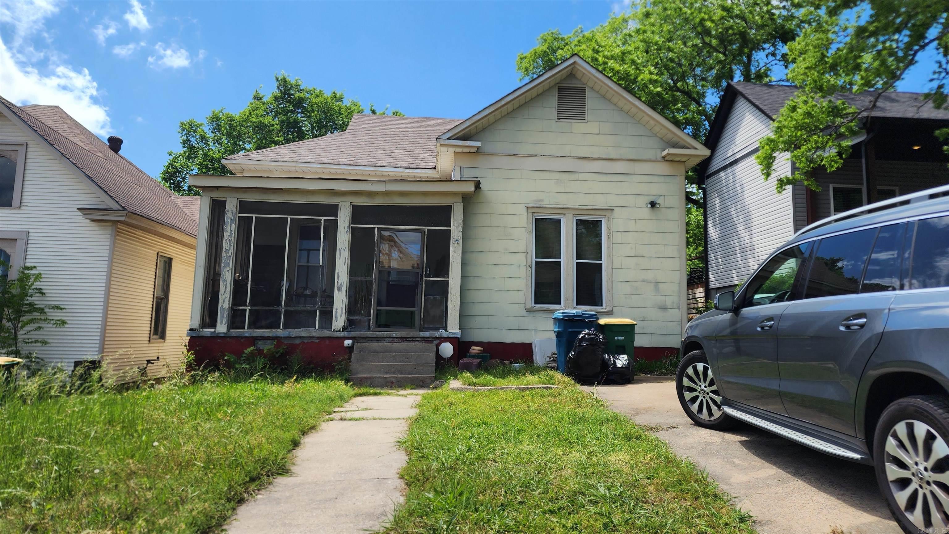 This 2 bed, 1 bath property features aproximately1,400 sq ft of living space (Measurements are approximate, please verify), plus two bonus rooms with limited ceiling clearance on the bottom floor. The front study adds flexibility, and the porch offers a clear view of the Capitol. Needs updates, but itās a solid opportunity for investors or buyers with vision. No Showings until Monday, May 5th, 2025