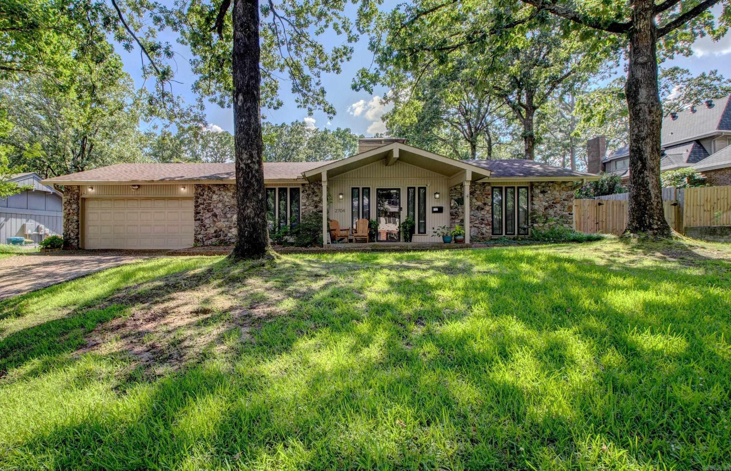 Experience Pleasant Valley in the classic way it was meant to be enjoyed with this 2,904 sq ft one level, big lot, and large in ground pool; The living area features a traditional site built wood burning fireplace with blowers, sky lights, and exposed wood beams, and flanking it are a separate office and a formal dining room; The ample eat-in kitchen with stainless appliances is adjoined by its oversized walk-in pantry area that also includes a desk, built-ins, and laundry room and half bath at the back of it; The spacious primary suite features a double vanity, jetted tub, and walk-in closet, and the other two bedrooms are bigger sized as well; Towards the back of the house is the large sun/game room that is the perfect spot for entertaining during those swim parties; The pool deck is a gorgeous flagstone, there is a newer hot tub that will convey, and there is also a newer outdoor kitchen with a grill, fridge, burner, flat top, leathered granite counter top, copper fire pit, and pergola. The yard is fully fenced, and there are both sprinkler and security systems including security cameras; Also zoned for Fullbright Elementary, Pinnacle View Middle, and Central High Schools.