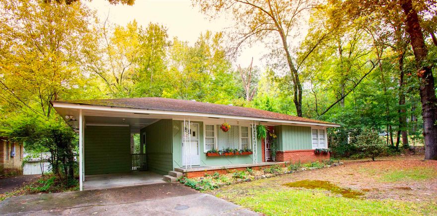 Awesome 2BD/1BA in Little Rock that is waiting for you to call home! Cozy and cute  hardwood floors, decorative fireplace, lots of storage space, carport, and private yard with deck. Located off of Colonel Glenn, close to shopping, dining and much more! This property is managed by Hoffman Team so beware of scammers - we will never ask you to Cashapp us money. The lease for this property is for 18 months to 2 years with a 3% increase after the first year. Income must be 3x the amount of rent. This property does not accept section 8.