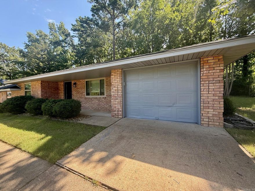 **Move In Special - 1/2 First Full Months Rent** Welcome to 779 Old Brundage Road, a charming 3-bedroom, 2-bathroom apartment located in the vibrant city of Hot Springs, AR. This apartment is designed with a modern aesthetic and offers a range of amenities for a comfortable living experience. The apartment features a no-carpet policy, ensuring a clean and allergen-free environment. The kitchen comes equipped with a refrigerator and the convenience of a washer and dryer is also provided, making laundry days a breeze. The apartment also includes lawncare services, allowing you to enjoy a well-maintained outdoor space without the hassle of upkeep. With its appealing features and prime location, 779 Old Brundage Road offers a unique blend of comfort and convenience.