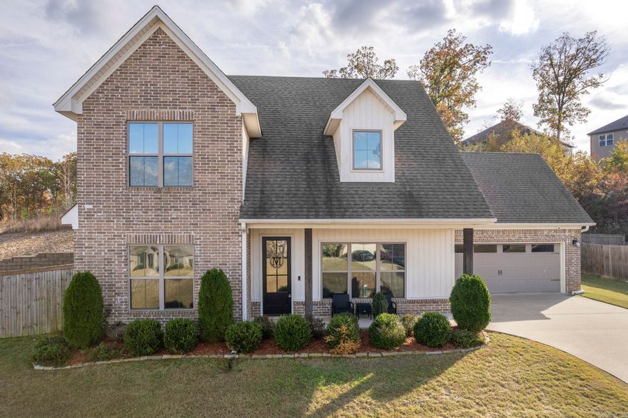 Welcome home to this beautifully designed 4BR/2.5BA retreat in the private, gated community of Lockridge Estates. Step inside to an airy, open layout where soaring double-height ceilings, warm wood floors, and a cozy gas log fireplace create the perfect gathering space. The kitchen features modern gray shaker cabinets, granite counters, a pantry, and an island with breakfast bar. The main-level primary suite offers a spacious bedroom, large soaker tub, custom tile shower with glass enclosure, double vanity, and a walk-in closet with direct access to the laundry room. Upstairs you’ll find three bedrooms, a full bath, and convenient access to a large floored attic for storage. The fenced backyard is ideal for relaxing or play, with a covered patio and plenty of room to enjoy.