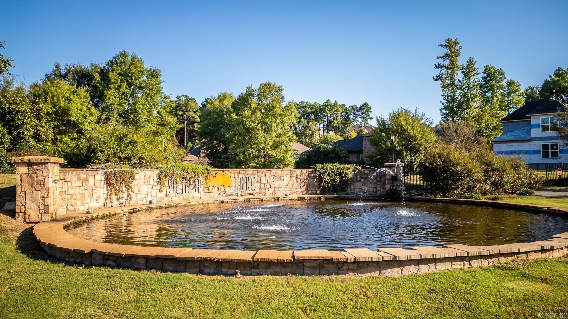 This location is conveniently located to the interstate and has so much to offer! A gated entrance with security cameras provides peace of mind. The subdivision offers a beautiful naturescape with a tranquil lake for fishing, a clubhouse for relaxation, gatherings, and fitness, tennis courts, and swimming pool. Walking paths threaded throughout. Sienna Lake rests on 365 forested acres, with generous buffers and green spaces remaining in a natural state. Over 80% of the home sites in Sienna Lake will adjoin green belts. Come, see, fall in love with your new homesite!
