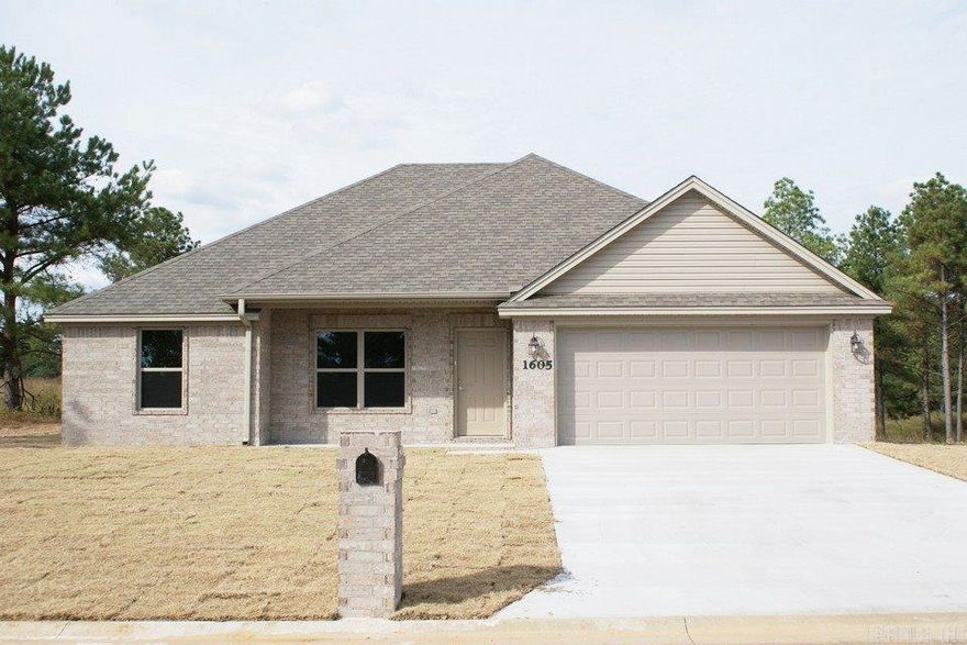 New home. This brick 3BR/ 2BA 1432 sq ft home is in one of Searcy’s newest subdivisions. This home offers a split floor plan, carpet, laminate and tile flooring, 2 car garage with keyless entry, big family room, and great landscaping. Large eat in kitchen with crown molding. Master Bedroom has crown molding and tray ceiling, large master bathroom with double sinks, and has a large walk in closet. Easy no-steps entry from garage into house. Yard is sod and landscaped.