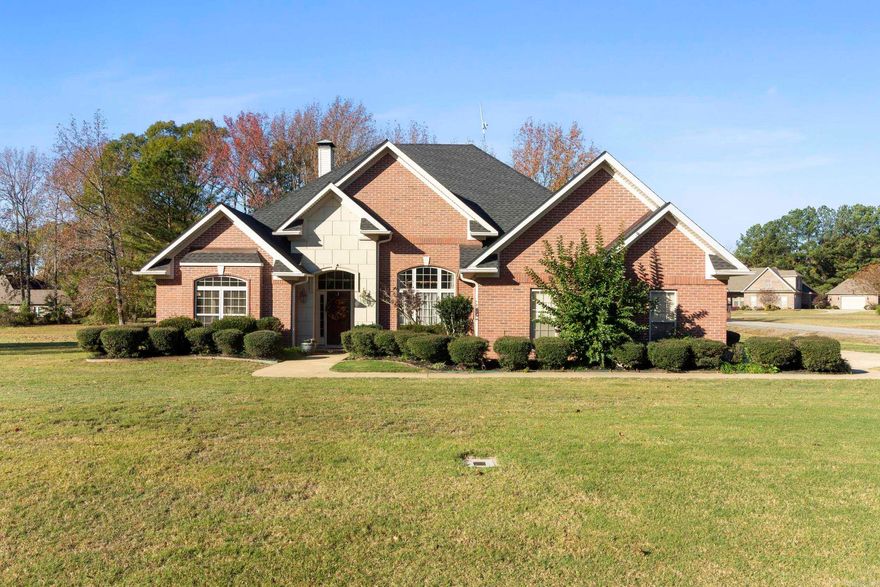 This home located in West Searcy offers the perfect blend of comfort, style and convenience. Located in Stoneridge Estates off of Booth on a large corner lot, it offers 4 bedrooms and two and a half baths.  It features a spacious updated master bath with heated floors, new quartz in kitchen, a new roof, newer HVAC and appliances.  This house has 16 foot ceilings throughout the main living area and a vaulted ceiling in the office/bedroom.  The large covered patio with a vaulted wood ceiling has surround sound and a large tv for great outdoor living space. Lock box by back patio door.