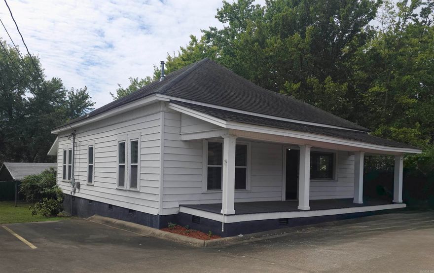 If you are looking for a move-in-ready office space in Clarksville, this is it! The building has been professionally updated and well-maintained, serving perfectly as a financial investment office for many years!   The updates were completed to complement the character of this building, originally constructed in 1978 - 10-foot ceilings throughout, windows to allow natural light into each room, and some original interior doors remain.   Once you enter off the welcoming front porch, there is ample space for a reception area, two large offices, a conference space, and a full kitchen and bathroom.    Don't miss out on the opportunity to make this space your own!