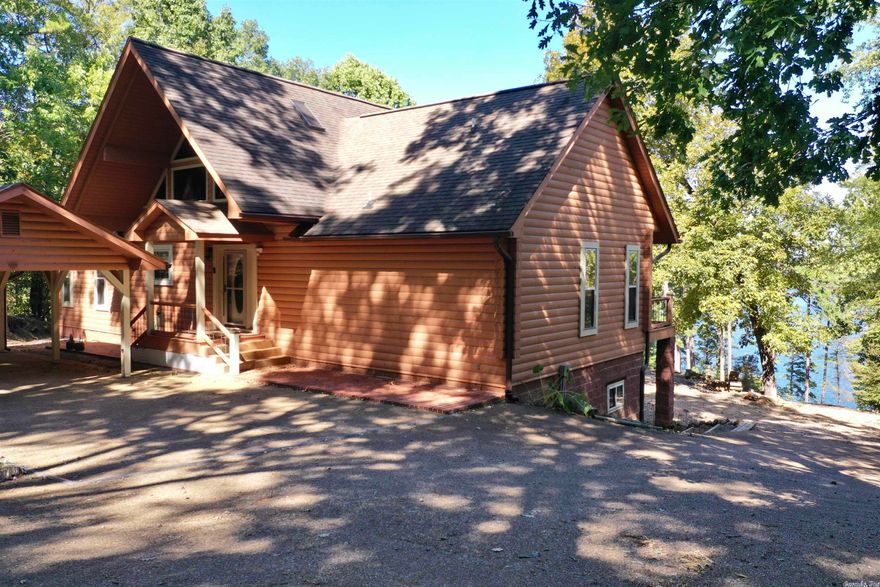 LAKE GREESON CABIN WITH BOAT DOCK! Homes like this don't come on the market often! This is a 2 story with a loft area cabin that features 3 bed, 2.5 bath, open concept living/kitchen area with large windows, primary bedroom with bath, fireplace, and deck to take in the lake views. Entertain in the basement game room that has a walk out to the patio, fire pit, & greenhouse! Property comes fully furnished. Walk down to the Lake and enjoy your very own boat dock! This is what life on the lake was meant to be!