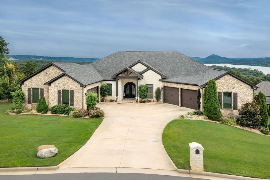 One of the most amazing homes in Central Arkansas.  An oasis on a mountaintop.  One level custom home with the finest Arkansas River and Pinnacle views around.  Enter home thru custom wood & iron dbl doors. Immediately you are enveloped by the incredible vista views from the wall of special order double doors.  Hardly a room in the home is lacking views!  First you will see a large, private home office (who wouldn't want to work from home here!).  Open floorplan w/ handscratched hardwoods adorning the large den with fireplace to enjoy the fall/winter eves.  Kitchen well thought out and adorned w/ every extra from pullouts, ice machine, double ovens, butlers pantry, upgraded gas cooktop and more.  Separate dining room backs to yet another set of views.  Outdoor kitchen with heated/aired pantry overlooking vista, yard & inground heated pool!  Fourth full bath services pool area.  Three separate bedrooms with excellent storage.  Knockout primary suite with barn doors, heated floors, free standing tub, 2 vanities and a massive designer closet to die for.  Extra office nook with auto dog door to dog run.  4 car garage.  Cement storm shelter.  Foam insulated rafters. Agents see remarks