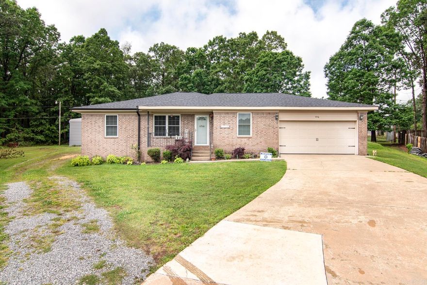 Welcome to Your Dream Home at Cara Jane Drive!  Nestled in the serene River Road Estates, this exquisitely updated and well-maintained residence promises a lifetime of comfort and style. Boasting a generous lot adorned with exceptional landscaping, this 3-bedroom, 2-bathroom haven is the epitome of modern living.  Step inside and be captivated by the dream kitchen, a true chef’s delight, featuring all new appliances, abundant storage, and elegant finishes including a welcoming kitchen island, sleek Corian countertops, chic backsplash, contemporary light fixtures, and a brand-new gas stove complete with a grill—perfect for entertaining. Plus, the newly installed refrigerator is included for your convenience!  The home’s durability is assured with a new roof and gutters installed in 2023, complemented by new energy-efficient windows and an updated HVAC system from 2018. But the true gems are the added amenities: a backup generator, storm cellar, and a metal-covered RV parking area with integrated workstations and ample storage.  Bathroom updates feature a walk-in shower, a new sink, a new commode, a new light fixture, and fresh paint!