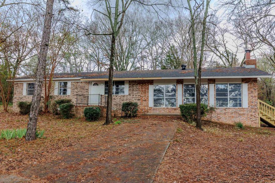 This home in the heart of Perryville has just been remodeled! NEW roof, flooring, paint and more! You are within walking distance to the grocery store and food options! This fully bricked home features 3 bedrooms, 2 full bathrooms, a large great room and sits on a .5 acre lot. (New survey will be completed by seller prior to closing. See pictures for approximate lot outline. Pink tape up on trees by road to show approx boundaries.) Lots of mature trees on the property. There is a screened-in porch on the back. Fiber internet is available at this home! You are on city sewer and have natural gas available, being in the city limits. This property qualifies for USDA RD 0% down payment loan. Contact your preferred lender for individual qualification details!