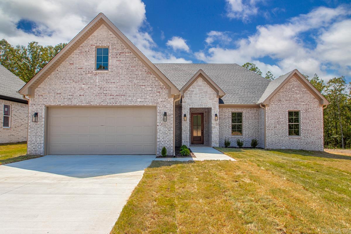 Welcome to 605 Valley Oak Drive in the sought after Millers Glen Subdivision in the heart of Sherwood! Valley Oak Drive is a BRAND NEW street! You could be one of the first couple homeowners on the street. One of the many perks to this New Construction- FLAT Driveway!! This kitchen has all the cabinets you could possibly need, PLUS a gas cooktop and a wall oven. The large windows in the dining area, and the living room will bring in all the natural light! Walk out to your large backyard with a beautiful green space! Another amazing perk- TANKLESS water heater!! There are so many amazing things about this build. Come see for yourself! Schedule your showing today.