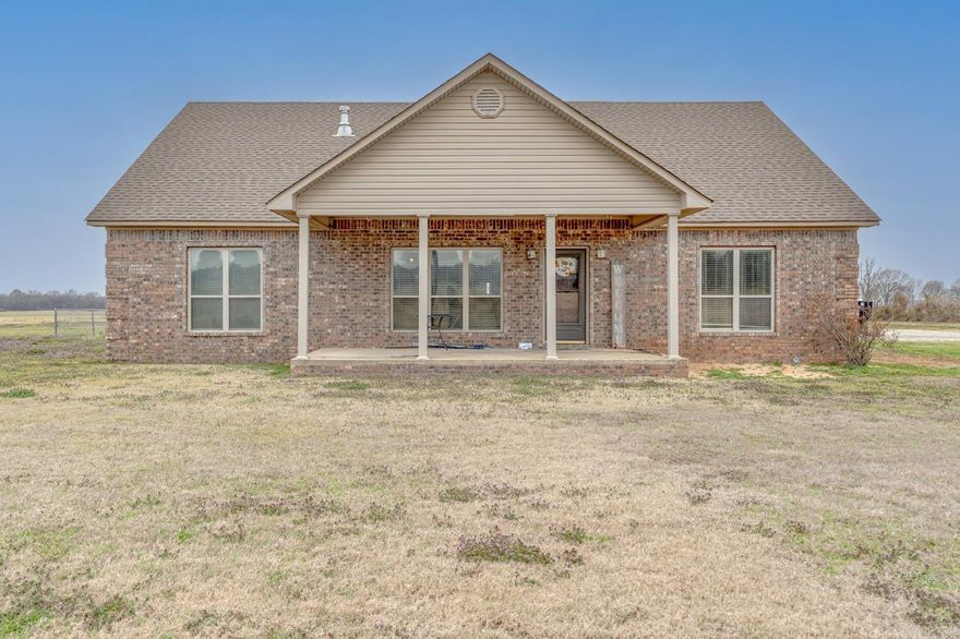 Welcome to Market 5041 Hwy 1 in Harrisburg, AR within the Harrisburg School District. Situated on 9.80 +/- level acres is a 2010 built all brick beauty topped w/ architectural shingles and accented by solar panels, covered front porch, enclosed back deck, chain link fencing and a 2 car side entry garage. The interior holds 2,290 sf of well laid out living space and features an open concept living, kitchen, and dining area w/ kitchen island, breakfast bar, stainless steel appliances, tiled backsplash and gas range. The Master features a walk-in closet and en-suite w/ tiled walk-in shower housing a clawfoot tub and dual vanity. 3 additional bedrooms, a guest bath w/ shower/tub combo, and a laundry room w/ sink complete the layout. The grounds feature a large gravel drive and a 30x68 shop w/ 2 lean-tos, concrete flooring, electric, propane heater, 3 overhead doors, 110 & 220 voltage and 14 foot walls. You'll love the enclosed back deck perfect for entertaining or enjoying the sunsets across the surrounding countryside. Conveniently located 20 miles to Jonesboro, AR and 60 miles to Memphis, TN. Call today to schedule your tour and make this country house with all the fixin’s your home.