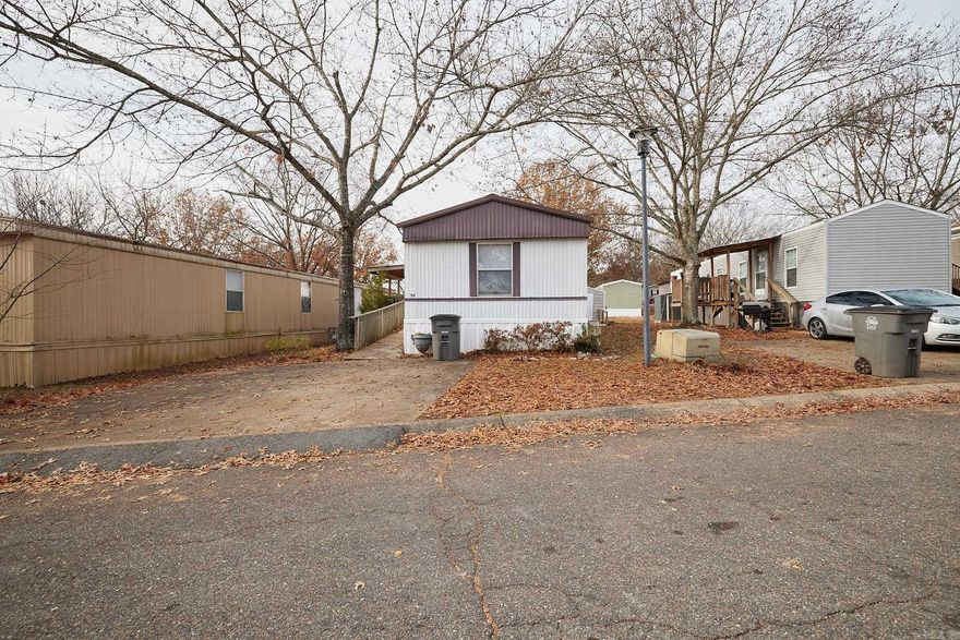 Affordable Living in a Quite Established Well Maintained Park.  Come See this 3 Bedroom, 2 Bath, 2000 Belmont Located in Combs Friendly Mobile Home Park.   This Place is Adorable.  You will enjoy the 8 x 10 Storage Shed for all your garden Tools.  All Appliances Convey