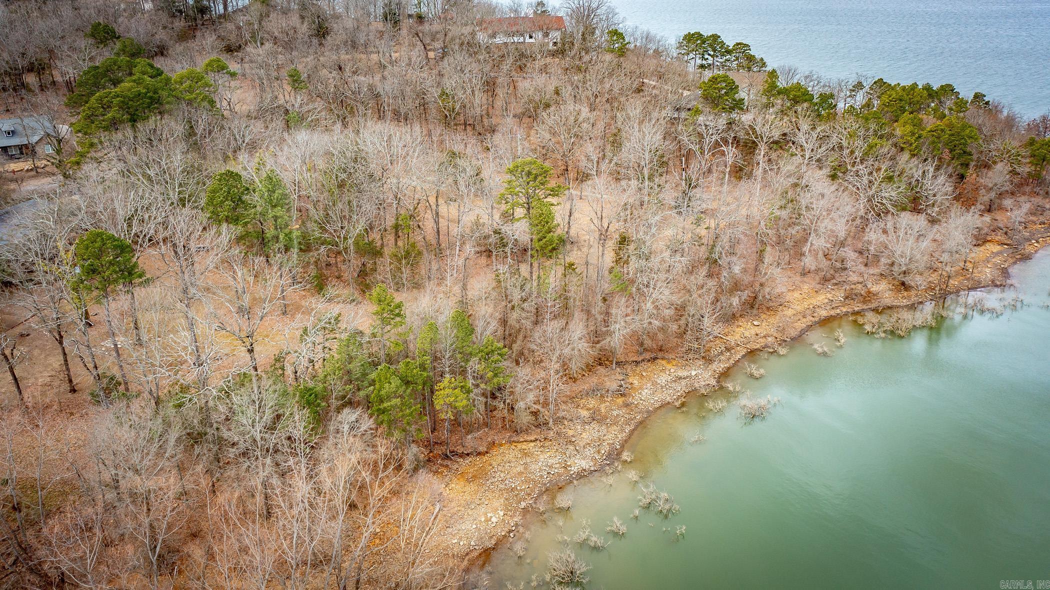 This never before listed 1.74 acre lot on Eden Isle with lakefront views from almost every angle is a true hidden gem! This huge Parcel is completely private, level and ready to build your dream home on the Isle! Don't let this one slip away, call today!