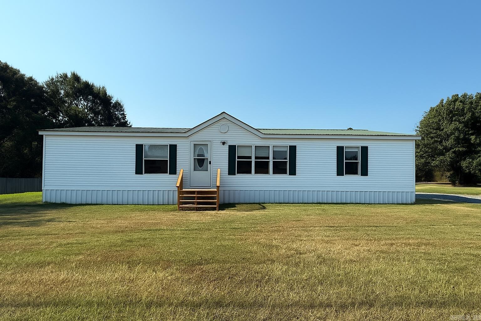This home is ideally situated near White County Central School, offering ample space to relax and enjoy a generously-sized backyard. The property features a charming covered back deck, along with two newly installed steps leading to the side and front entrances. Inside, you will find a large laundry room and a spacious kitchen equipped with a breakfast bar and plenty of cabinetry. This residence is ready to become your home sweet home.