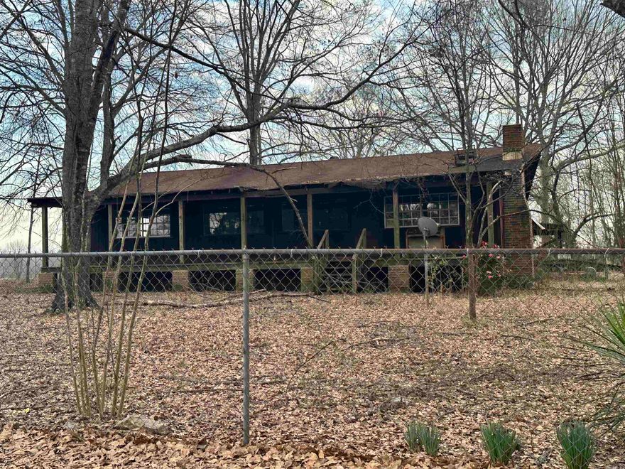 Looking for a "FIXER UPPER"?  This property offers a serene rural setting, yet just a short drive from the amenities of town. This home with a vision and some love  presents an ideal opportunity for those seeking a peaceful retreat. Whether you’re looking for a permanent residence or a weekend getaway this property has the potential to fulfill your desires. There is also another mobile home on the property that is tenant occupied.