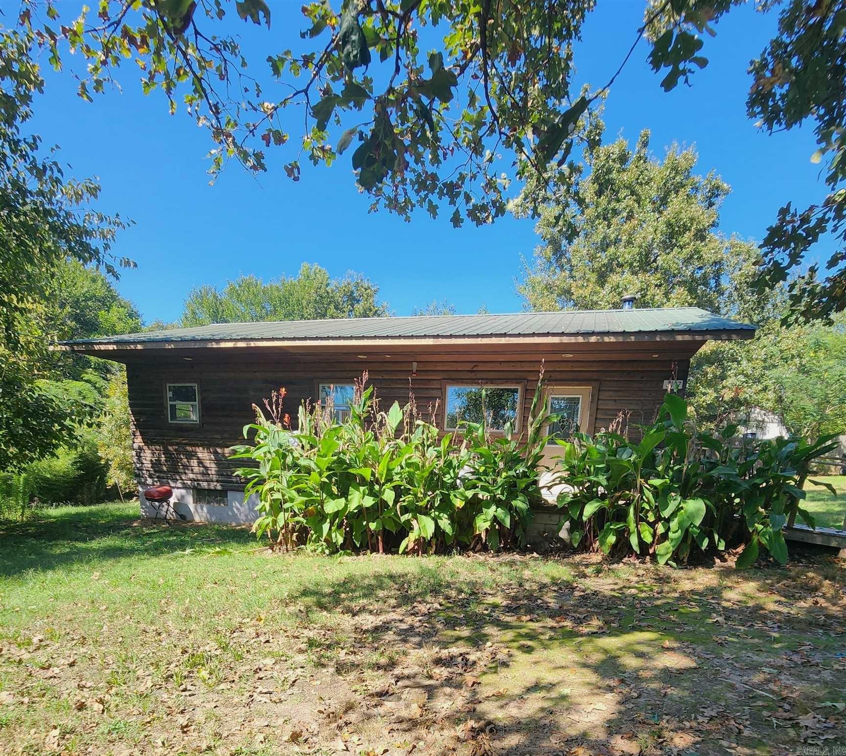 Whether you're a first-time buyer looking for a project or an investor with a vision, this fixer-upper is a diamond in the rough. With some TLC, it can become the home of your dreams. One acre lot inside city limits. Inside & outside access to the basement. Large kitchen. Wood heat. Multiple storage buildings. Garden area. Quiet neighborhood. Call for your showing today!