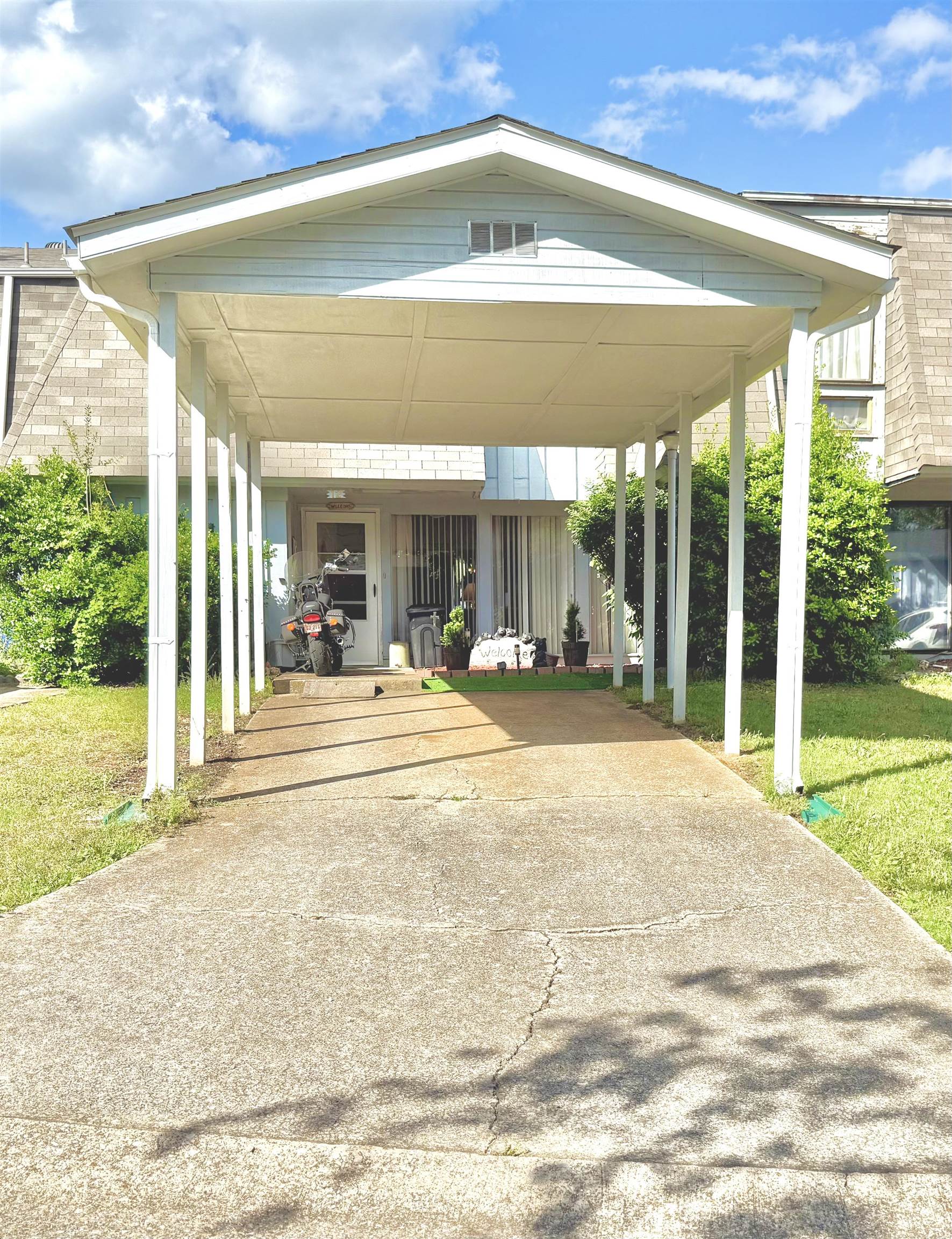 WELCOME to this well-maintained, partially-furnished townhouse in the heart of picturesque Cherokee Village! This 3 bedroom 2 1/2 bath features a breakfast bar, a utility room with ample cabinets, an outside storage space, and a back patio that comes with furniture and a fire pit. The carport with gutters was added in 2023. The HVAC, water heater, elec stove, and refrigerator were replaced very recently. The new roof is about 2 years old. Some furniture such as couches, bar stools, a dining table w/ chairs, a queen bed and twin beds, even a brand-new rowing machine, convey. Cherokee Village boasts 7 beautiful lakes, access to the Spring River, swimming pools, golf courses, hiking trails, and picnic areas that provide innumerable opportunities for outdoor fun! Call now to own this fantastic piece of property!
