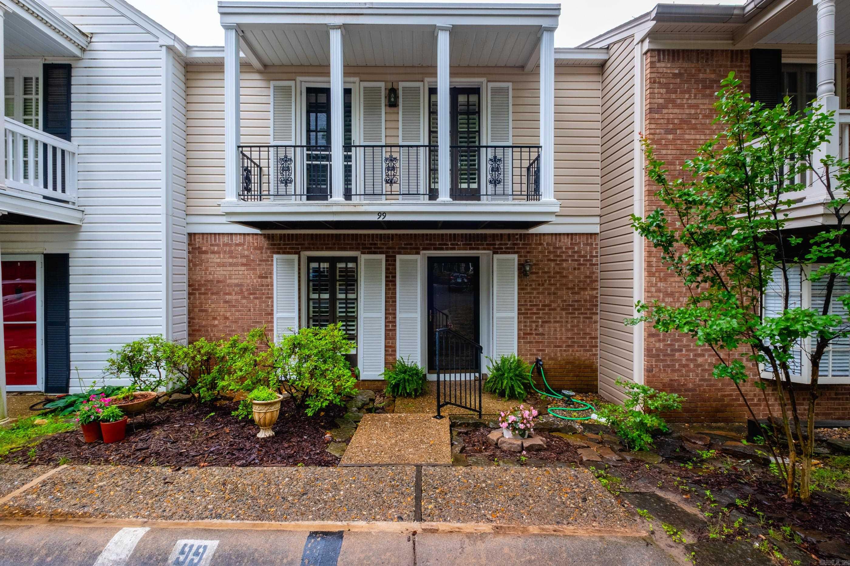 Easy- living condo in the heart of Pleasant Valley! Quiet, tree-lined compound with a park-like atmosphere that also includes tennis court/ pickle ball court, swimming pool and recently refurbished party room. Condo has been freshly painted. 2 bedrooms and 2 bathrooms up. Oversized patio off the back. Two assigned parking spots. Come see! *Monthly dues are going up to $350 starting in August*