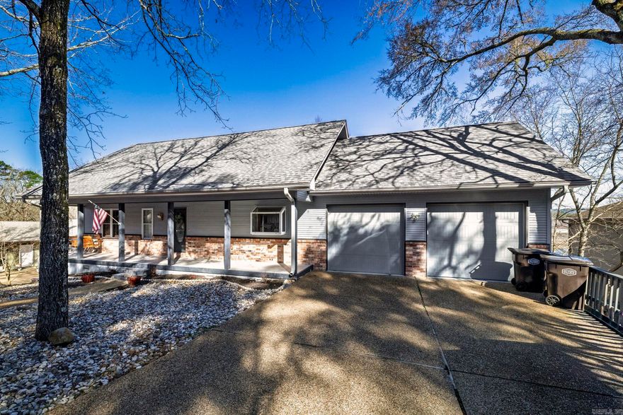 This property has character throughout. From the moment you walk in you are greeted with vaulted ceilings and extensive wood trim and accents. The main level includes your primary bed and bath and rooms for relaxing and entertaining. Additional bedrooms and family gathering areas up and down. Perfect for multi generational gatherings or large friend groups.  Call for rental records which include bookings year round! Looking for a new home for just you, no problem.  Bookings go away and you can make your dream of lake living a reality! Bonus with this home is all the extra storage areas, perfect for a large workshop and/or  room to add additional bed and bath if desired. Nearly half an acre waterfront with boat dock. Currently a nightly rental with proven track record.  All furnishings and household items remain.