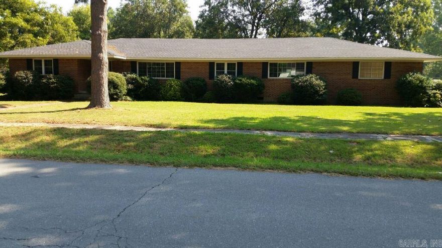 Brick home offers 3 bedrooms, 2 bathrooms, formal dining room, office and carport set on large corner lot.  Home is on corner lot next to the school. To submit an offer on the property for consideration, click on the following link to submit through RES.NET: RES.NET Property Offer. Property is As-Is, seller will do no repairs.  Buyer is responsible for turning all utilities on for inspections (when in contract)  Buyers must sign Program Compliance forms and return with offer.