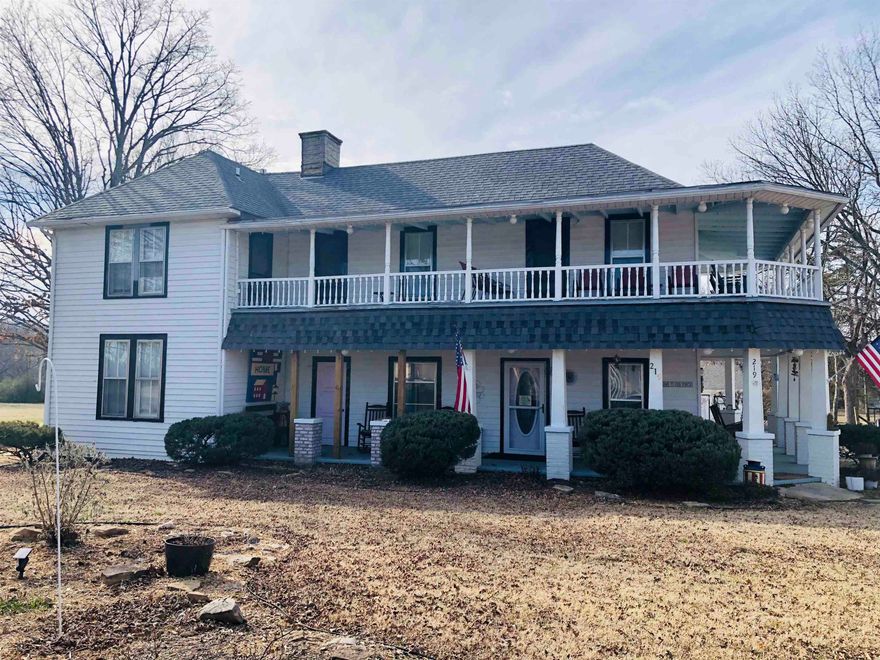 Discover a charming bed and breakfast in the heart of the Ozarks, located in scenic Mountain View, Arkansas. Just a short walk from the lively town square, this inviting property features two cozy buildings. The main building serves as a warm, welcoming bed and breakfast, perfect for guests seeking a peaceful getaway. The second building is a single-family-style home, ideal as a private residence or additional guest space. In the back, you’ll find a private dog park—perfect for pet-friendly accommodations or personal enjoyment. With rustic charm, comfortable spaces, and a prime location near shops, restaurants, and the town's famous folk music scene, this property offers endless possibilities for hospitality or personal use. Experience the beauty of the Ozarks with this one-of-a-kind opportunity!