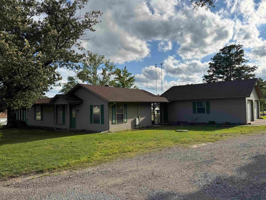 Covered patio overlooking a spacious back yard...aprx 1 acre and a shop, plus a  Home with lots of character and large rooms.  Primary bedroom has walk in closet and space for a sitting area to make this your private retreat, kitchen has many cabinets and countertop space to prepare favorite meals, formal dining and bonus space off the kitchen.