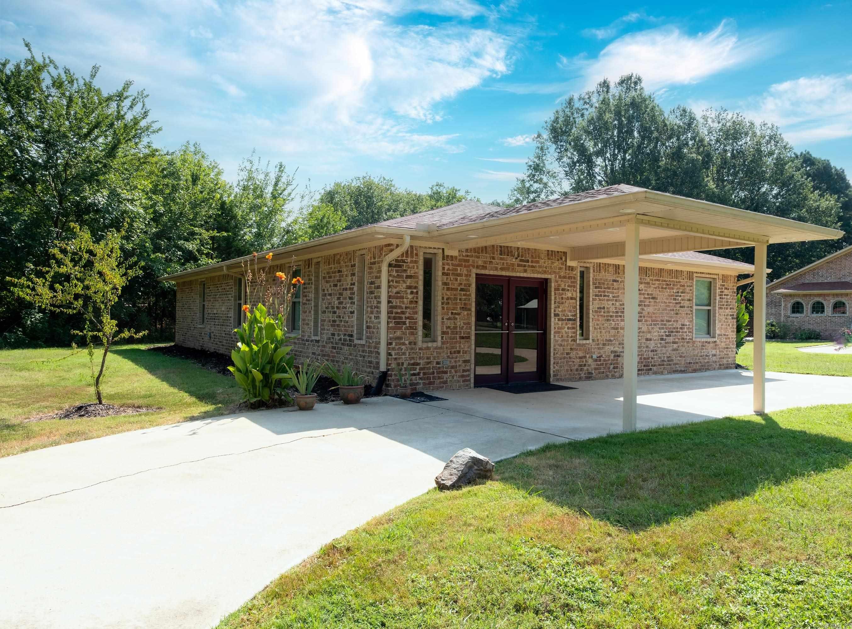 An all-brick, single-story structure, located right off Hwy 300 just past Pinnacle Mountain. Commercially built medical therapy clinic in Pulaski County WITH NO ZONING RESTRICTIONS. Options for redesigning to repurpose for its highest and best use.. An open clinic/office concept currently makes for a good blank canvas. it's ready for professional use! This property comes equipped with an 8’ x 16’ Indoor heated therapy pool with Endless Pool current generator, washer and dryer, a separate handicap accessible shower and bathroom, refrigerator, microwave, electric stove, with porcelain tile, bamboo flooring and Corian countertops throughout. The circle drive offers plenty of open space for parking. Start your own practice or reimagine the interior to fit your needs as an Urgent Care, Florist or other. If personal use is the need, this one can be turned into a home with a fun project. The new Visitor Center expansion brings numerous locals and travelers to enjoy the view from the Summit continuously. Don't miss an opportunity of ownership interest in real estate!