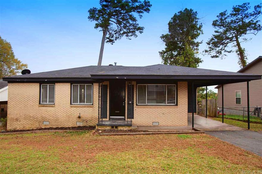 Three bedroom, one bathroom home conveniently located by UALR.