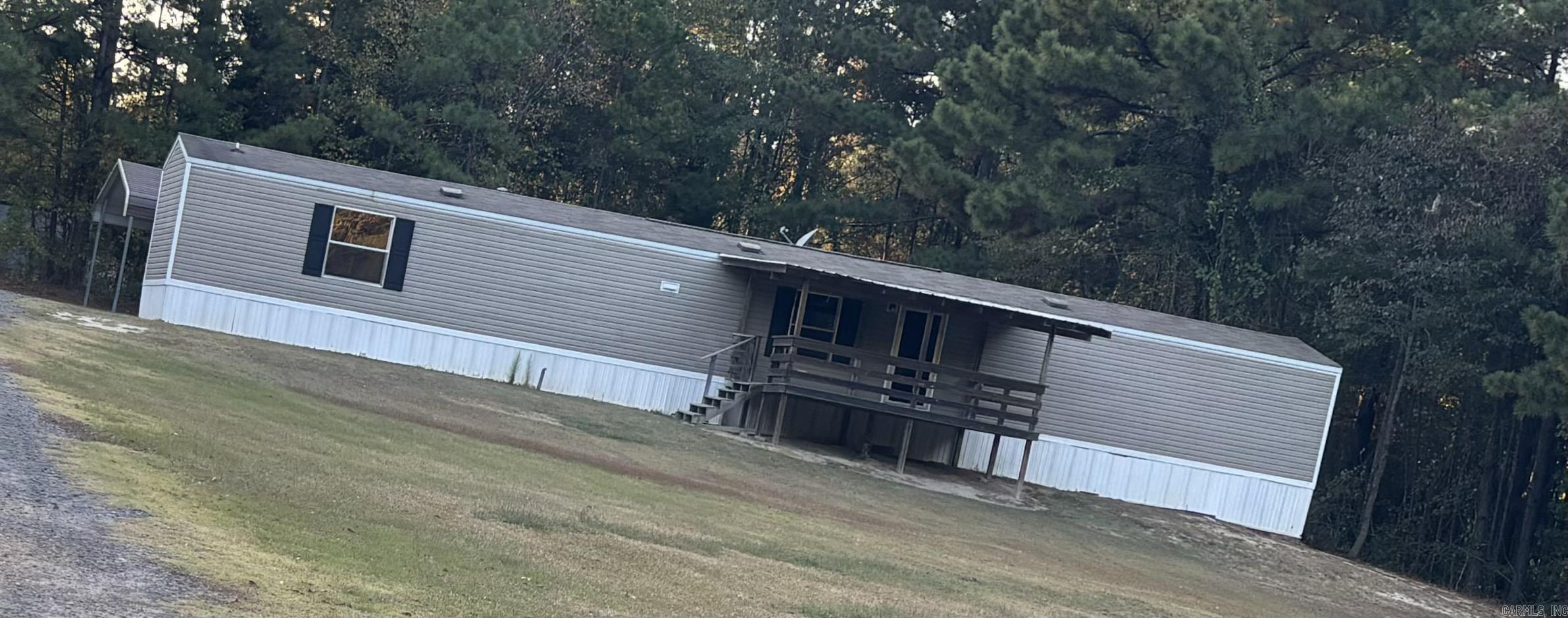 Beautiful mobile home that sit on over five acres.