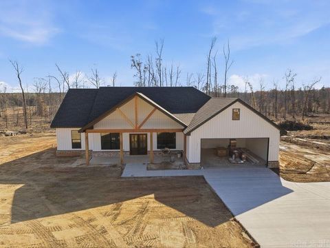 Photo of 10589 West Miller, Bauxite, AR 72011 (MLS # 25048893)