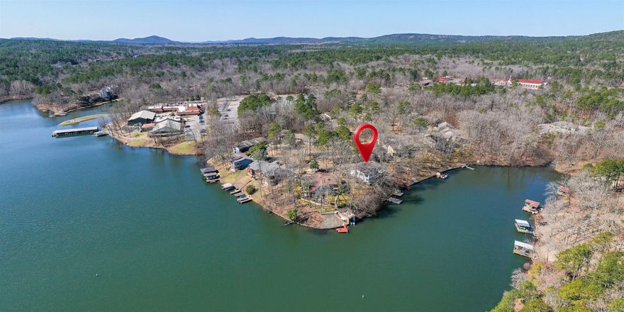 Rare opportunity to be on the water at this price!!! Watch the sunrise over 380 acre Lake Coronado from this Charming 2 Bedroom 2 1/2 Bath end-unit! NEW flooring, paint and trim - Freshly stained Deck with Panoramic View! *Lake is drawn down every 6th year to allow for deck building/repair and dredging of shallow coves - that year is NOW! Take advantage and build a swim or boat dock to fully enjoy this water ski lake! Kitchen and Living Rm with 1/2 Bath on Main Floor + 2 Bedrooms, Laundry, Full and 3/4 Bath Downstairs. Covered lower Deck with access down to the Lake! POA Dues are $113 per month. Townhome dues of $90 per month include trash pickup and common area maintenance.