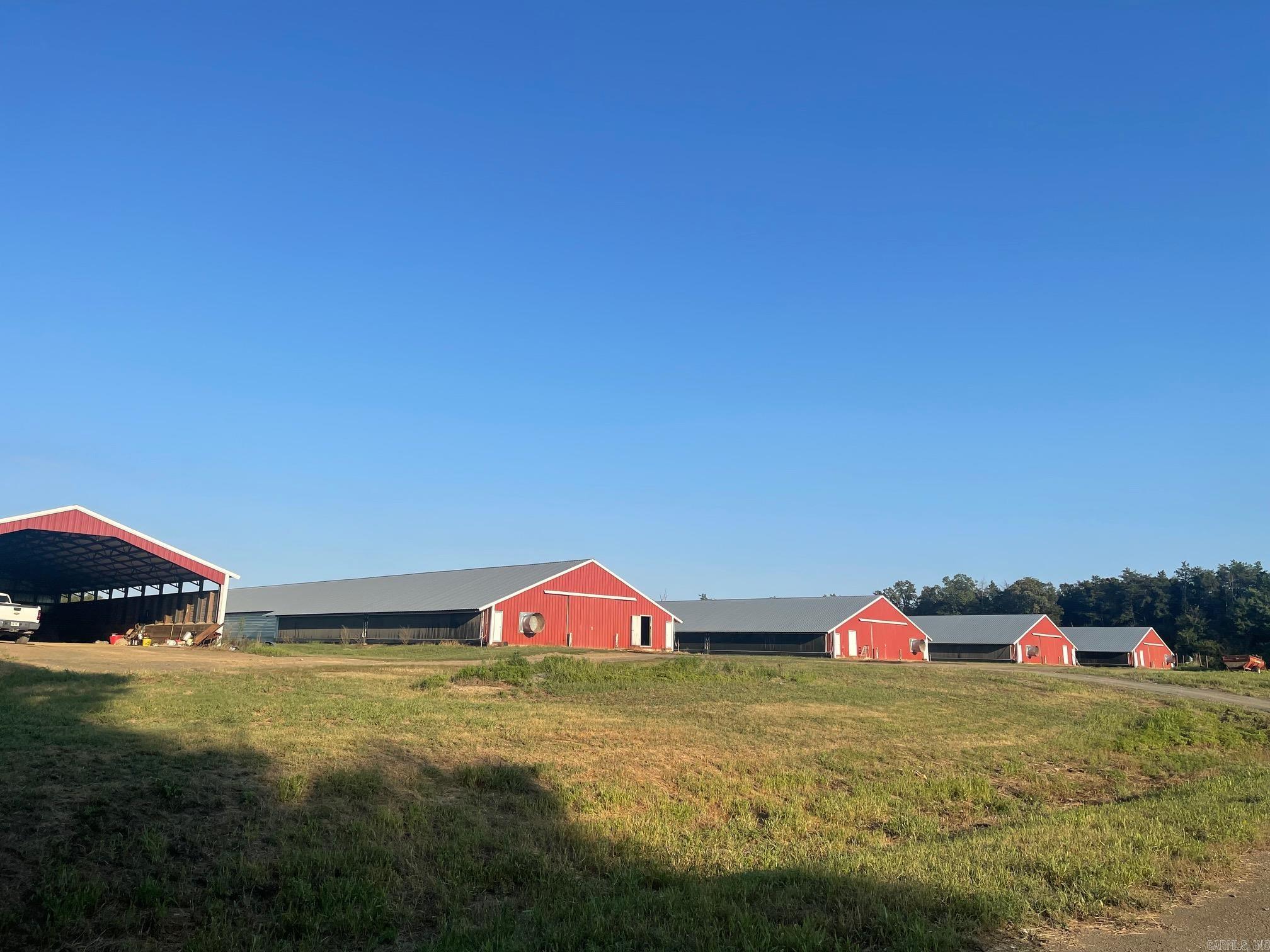 This is a producing 7 House Broiler farm for Tyson Foods Grannis/Broken Bow. 4 Houses were built in 2011 and 3 were built in 2008. There are 2 stacking sheds, 2 water sheds, 2 generators and a compost Shed on this Farm. Financials provided to Qualified buyers with Proof of Funds or Letter from Bank. Update list from Tyson available.