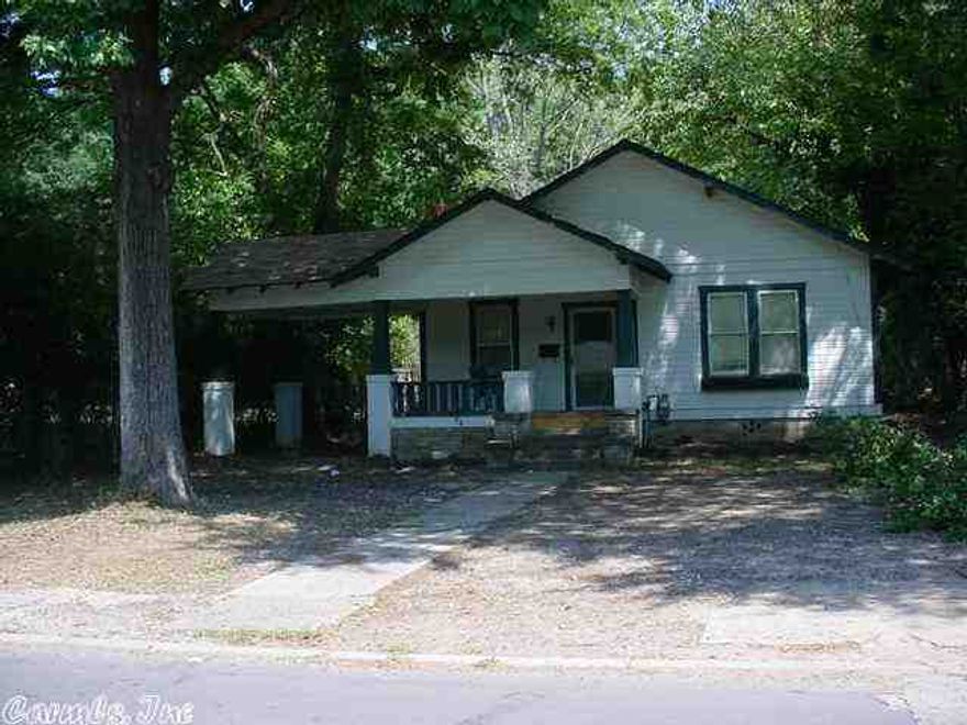 Attractive three bedroom two bath home w/formal living & dining rooms, central heat/air, fireplace, covered sun deck, carport, storage bldg.  Property is sold "as is" no property disclosure.