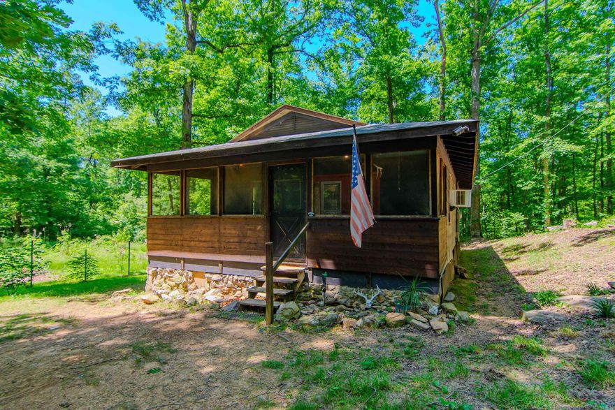 Check out this great investment opportunity! This property is a fixer-upper.  It has a cozy cabin with almost 4 acres of land located in Saline county and the Bryant School District.  If you are a nature-lover, you'll love the fact that this property is a couple of miles from the Winona Wildlife Management Area located within the Ouachita National Forest. The cabin features a covered porch, 2 bedrooms and 1 bath.  All appliances convey (including the washer and dryer)!  Included with this quaint hide-away, is a nice storage building and a spacious chicken coop. And that's not all!  This property is a corner lot and if you're looking for a place to build your dream home, check out the top of the hill adjacent to the cabin.  Additionally, this property is conveniently located near Benton, Bryant, Little Rock and Hot Springs (@ 30 minutes from Benton, Bryant and Little Rock and @ 45 minutes from Hot Springs).  This is a property that has great potential with many options!  Please note: This property is sold "AS IS."  *Agents Please See Remarks*