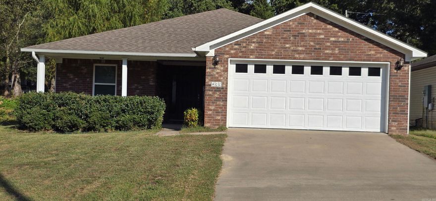 Conveniently located move-in ready 3/2 in Benton Schools. Split floorplan with beautiful hardwood flooring in living room and halls, tile in wet areas, carpet in bedrooms, an abundance of wood cabinets with granite, stainless appliances, crown molding, pocket door to laundry, tons of closets, floored attic space, large covered front porch and private fenced back yard with patio. NO special assessment!